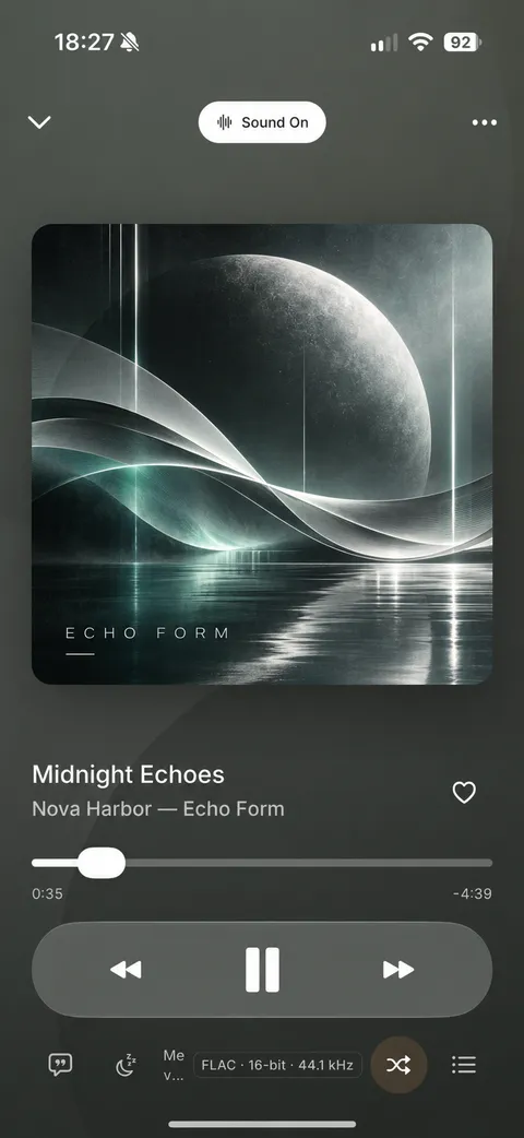 Now Playing in Discata: album artwork, the Sound On switch, a seek bar, playback controls and a FLAC 16-bit 44.1 kHz quality badge.